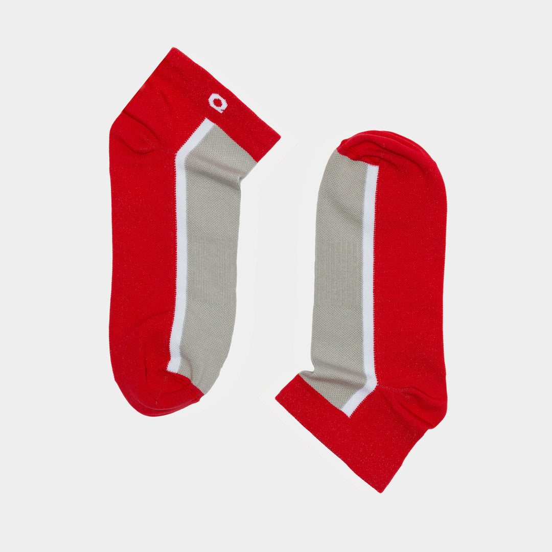 A pair of short red socks with a wide gray stripe down the center and a thin white stripe along the edge, displayed flat on a plain white background.