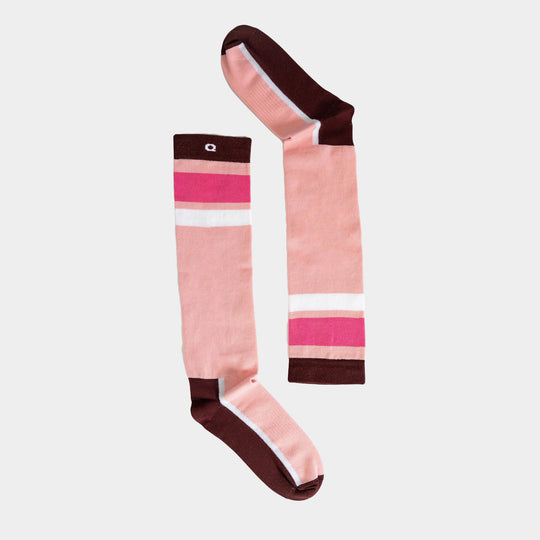 A pair of knee-high socks with pink, white, and magenta stripes, featuring brown toes, heels, and cuffs, displayed on a light background.